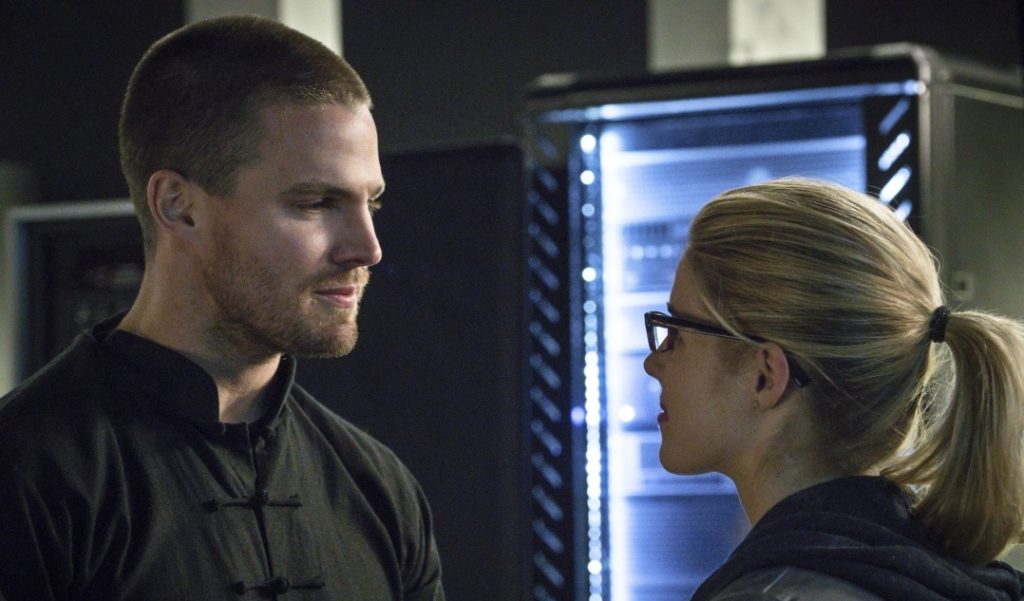 Arrow -- "My Name is Oliver Queen" -- Image AR323B_0226b -- Pictured (L-R): Stephen Amell as Oliver Queen and Emily Bett Rickards as Felicity Smoak -- Photo: Liane Hentscher/The CW -- ÃÂ© 2015 The CW Network, LLC. All Rights Reserved.