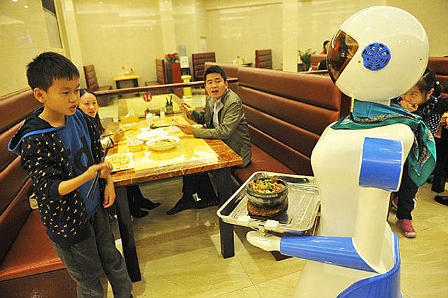  A Chinese restaurant owner inspired by the restaurant Bots from the hit US show Sam and Cat has created a restaurant filled with robots. The robot restaurant on the TV show features robot waiters like Tandy and Bungle, and now a restaurant in Ningpo, a seaport city in north-eastern China's Zhejiang province, has also taken on robot staff. Although wages for the robots in the city's Liancheng shopping mall are non-existent, they still do not come cheap at around 6,000 GBP each. But with a five-year-warranty on each robot, and the fact that they only need to be charged four-hours-a-day, the owner Lu Dike, 48, reckons in the long-term it is going to save a fortune on wage bills. And the robots have not just been popular with fans of the US series, but also with people who have not even seen the show and want to experience being serviced by robot staff. The "waiters" navigate their way around with the use of an optical sensing system, enabling them to independently serve food to any table within the restaurant. Additionally, the robots have the capability to speak up to 40 phrases in Mandarin Chinese, such as "enjoy your meal". And restaurant owner Dike is even being pressured now to put the robots on sale for people to take home. He said: "I get asked at least once a day if I'm prepared to sell one of them, who knows, maybe it might be a good sideline." One of those who wants to buy one was customer Xu Yuan, 34, who said: "I really like the service and I think I would really like one at home, my son has been pestering me ever since we came here for a snack after a trip to the movies." (ends)