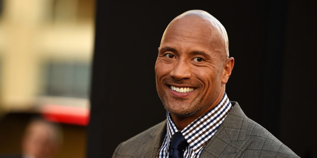 Actor Dwayne Johnson attends the premiere of "Hercules," July 23, 2014 at TCL Chinese Theatre in Hollywood, California.  AFP PHOTO / Robyn Beck        (Photo credit should read ROBYN BECK/AFP/Getty Images)